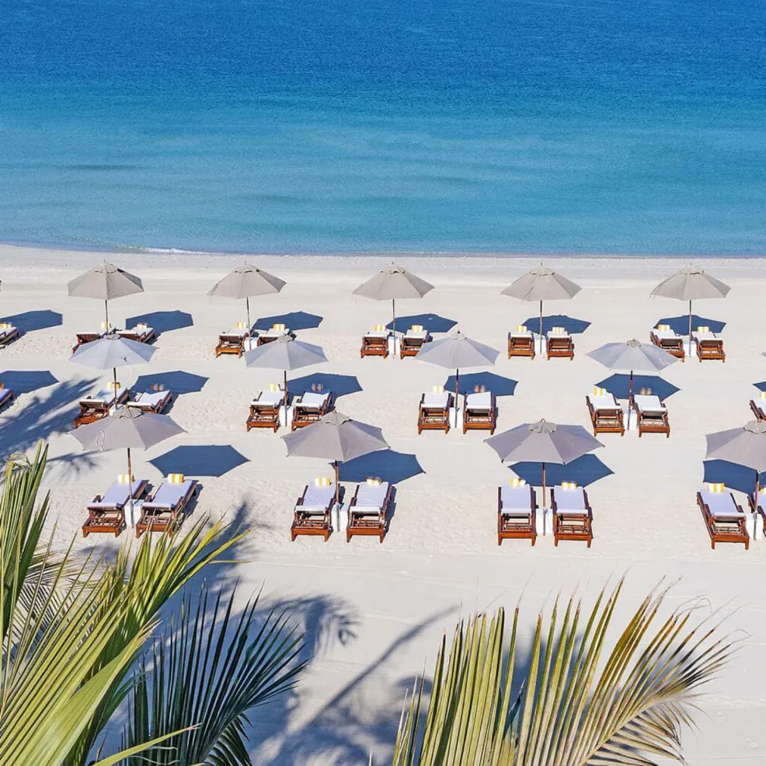 Odysseys Travel - Al Zorah Beach Resort - Beach Umbrellas