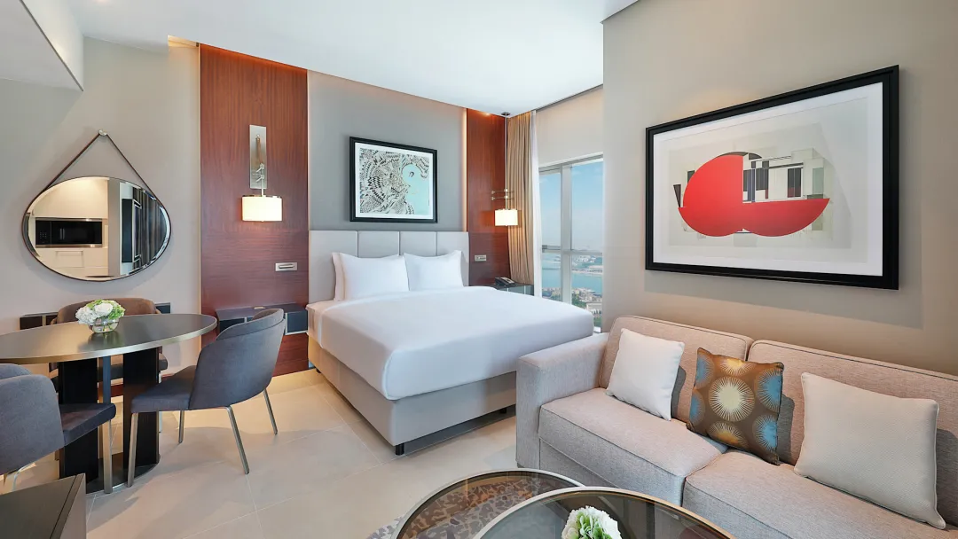 Odysseys Travel - Hilton Doha The Pearl - Rooms - King Studio High Floor with Balcony - Bedroom