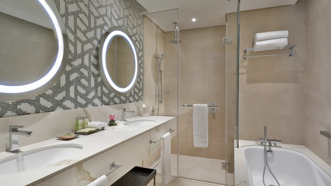 Odysseys Travel - Hilton Doha The Pearl - Rooms - One Bedroom Suite Partial Sea View - Bathroom