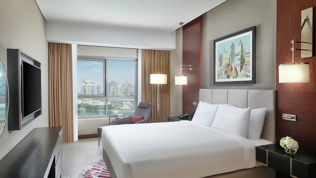 Odysseys Travel - Hilton Doha The Pearl - Rooms - Deluxe One Bedroom Suite Sea View Balcony - Bedroom