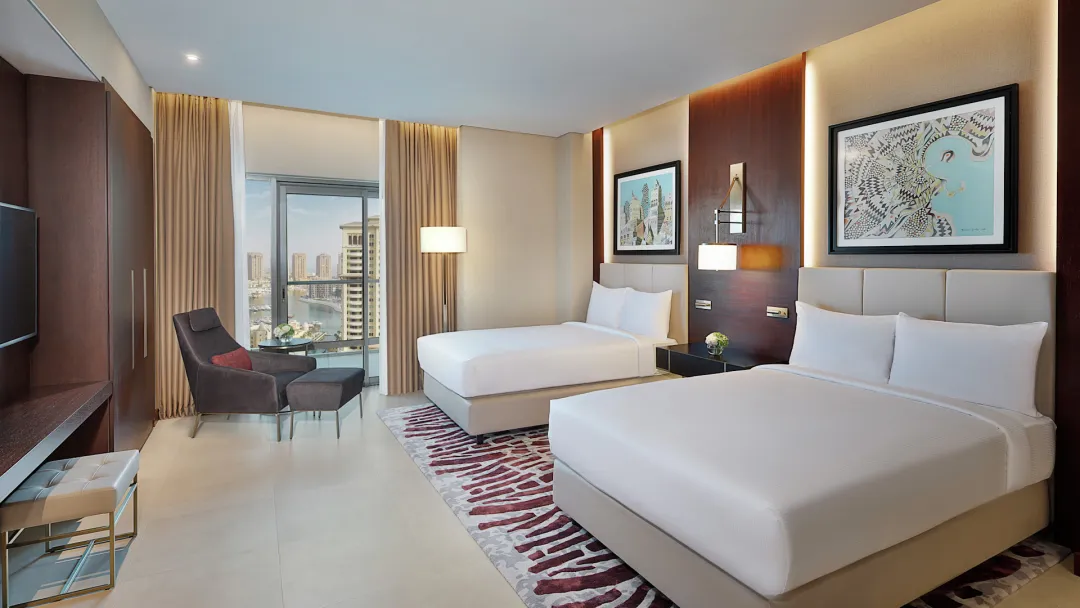 Odysseys Travel - Hilton Doha The Pearl - Rooms - Two Bedroom Suite High Floor Sea View - Bedroom