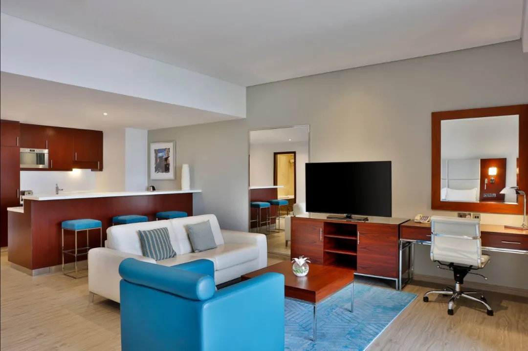 Odysseys Travel - Hilton Dubai The Walk - King Junior Suite with Sea View and Balcony - Lounge