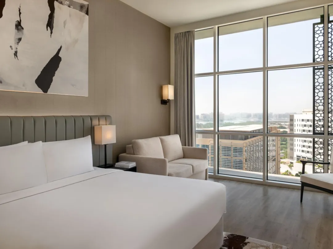 Odysseys Travel - Yas Plaza Marina by IHG - One King Deluxe Plaza View Theme Park Access - Bedroom