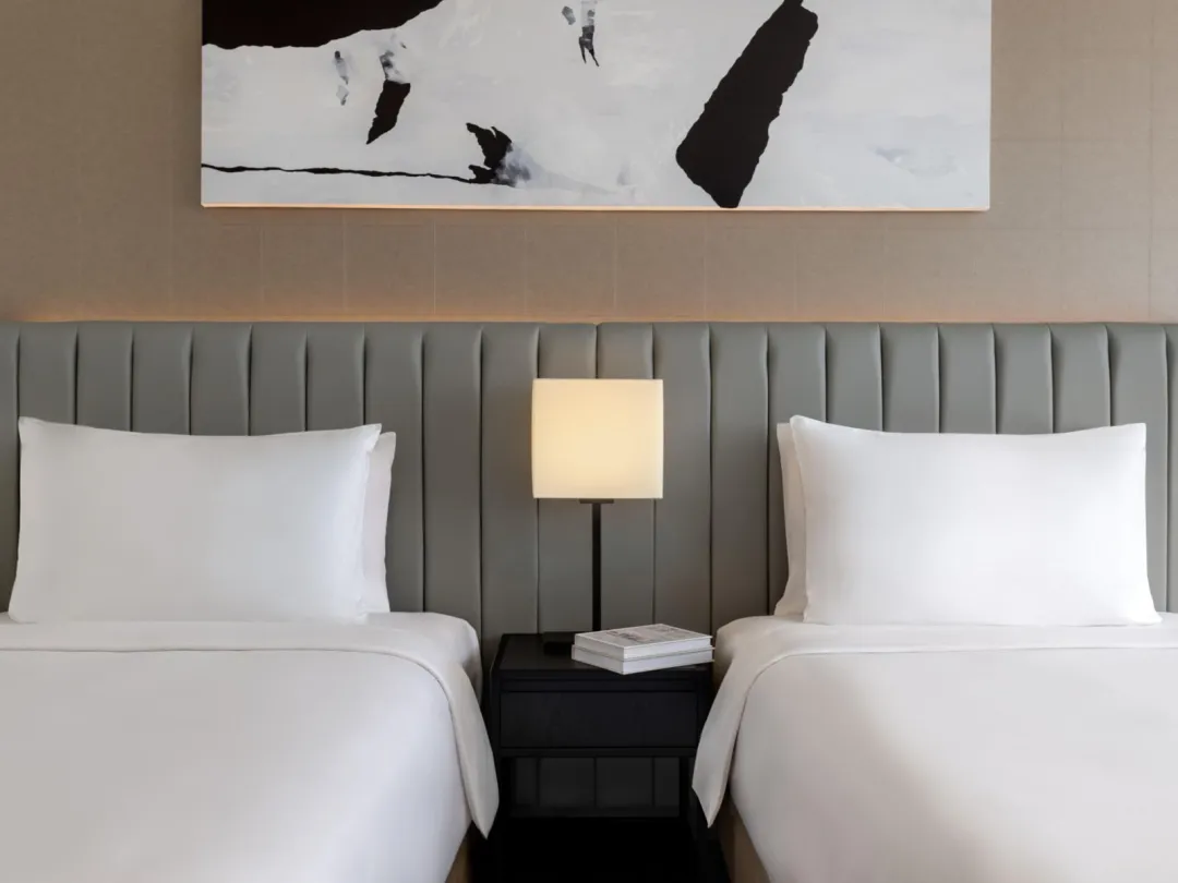 Odysseys Travel - Yas Plaza Marina by IHG - Two Twin Deluxe Plaza View Theme Park Access - Bed Detail