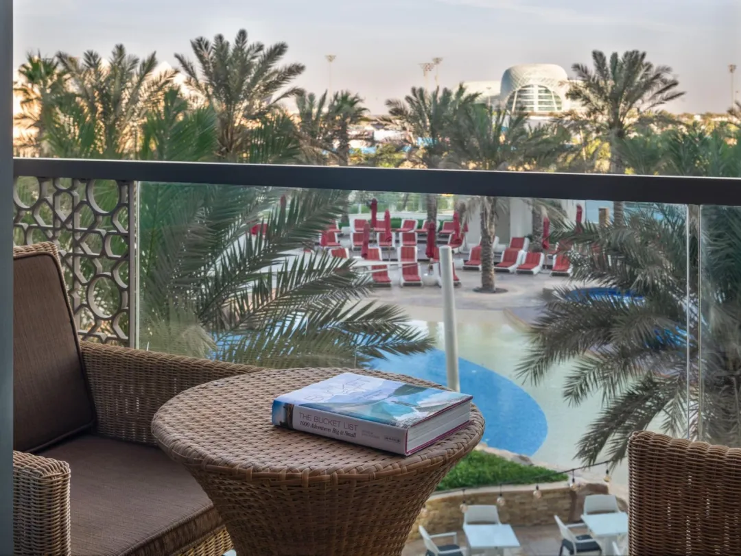 Odysseys Travel - Yas Plaza Marina by IHG - One King Deluxe Pool View Balcony Theme Park Access - Balcony