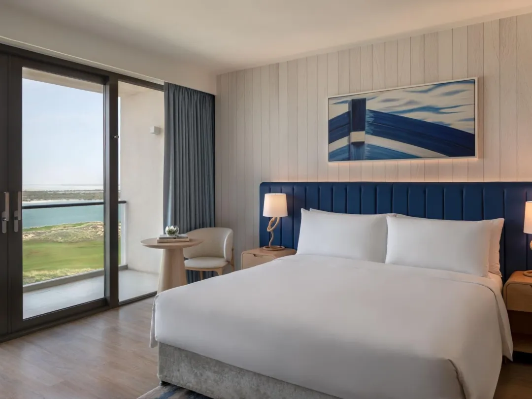 Odysseys Travel - Crowne Plaza Abu Dhabi - Yas Island by IHG - One King Deluxe Sea View Balcony Theme Park Access - Bedroom