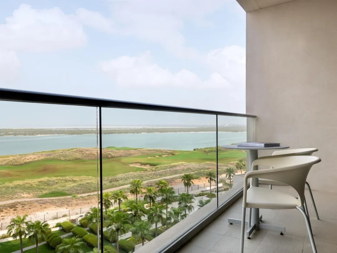 Odysseys Travel - Crowne Plaza Abu Dhabi - Yas Island by IHG - One King Deluxe Sea View Balcony Theme Park Access - Balcony