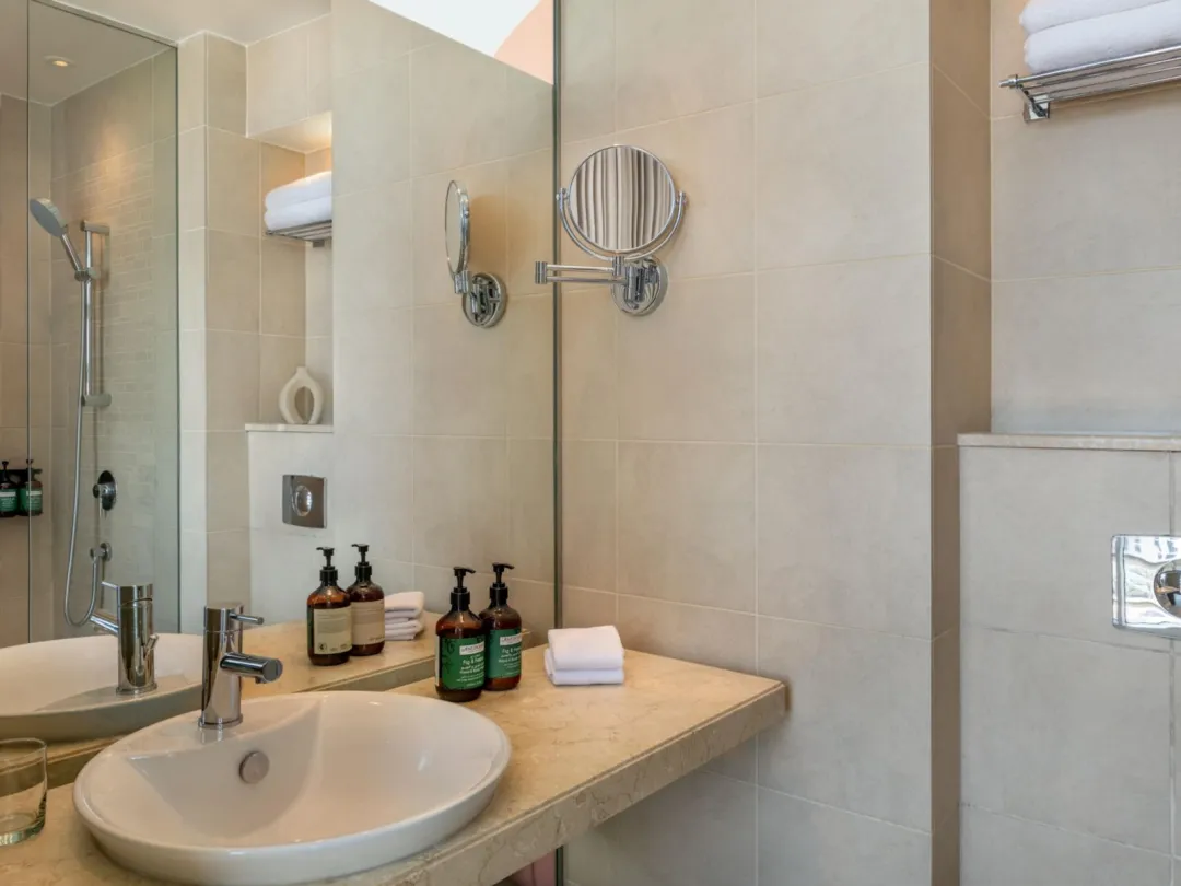Odysseys Travel - Yas Plaza Circuit - Yas Island by IHG - One Queen Family Suite Plaza View Theme Park Access - Bathroom