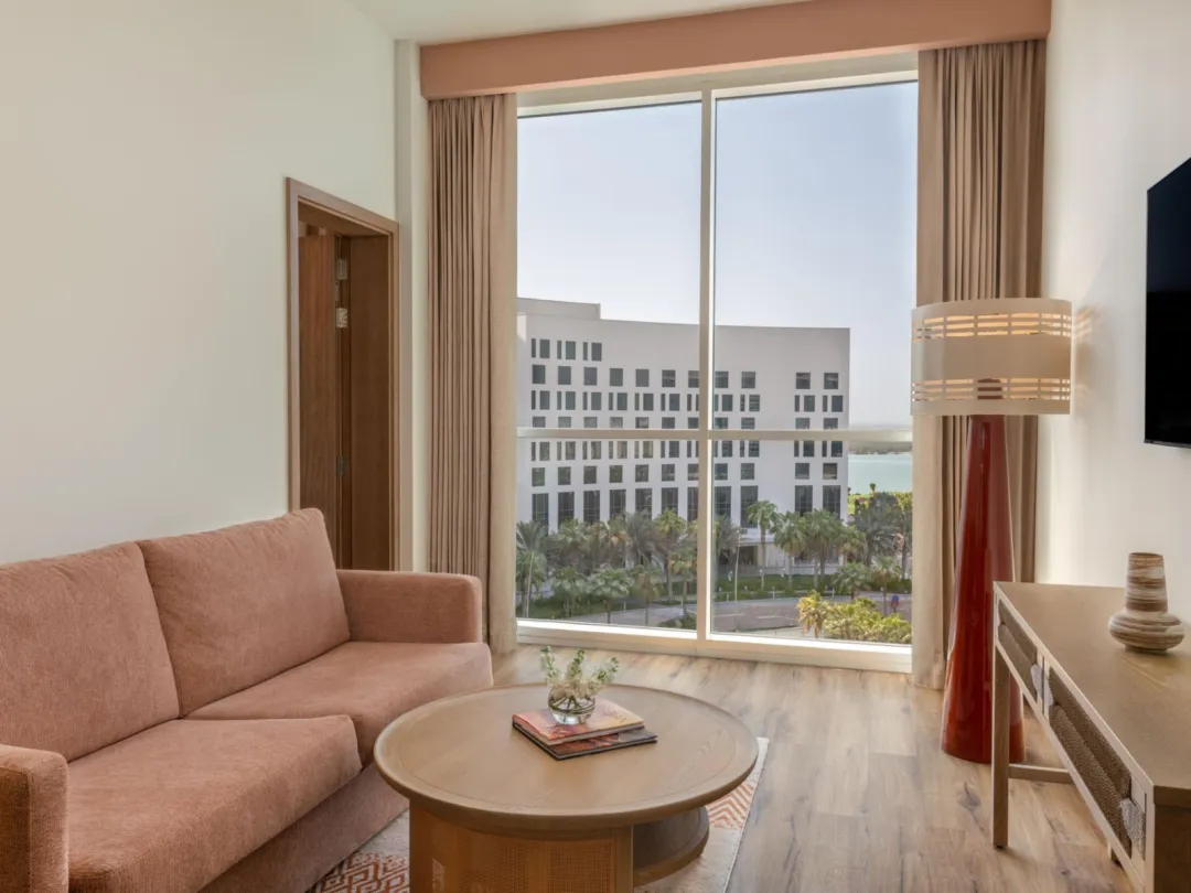 Odysseys Travel - Yas Plaza Circuit - Yas Island by IHG - Deluxe Family Queen Room Plaza View Theme Park Access - Living Area