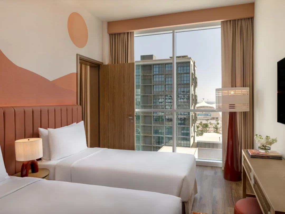 Odysseys Travel - Yas Plaza Circuit - Yas Island by IHG - One Queen Two Twin Family Suite Plaza View Theme Park Access - Bedroom (Twin)