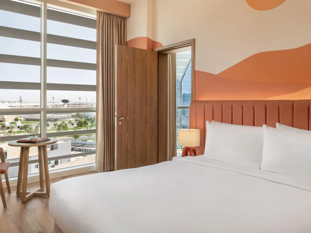 Odysseys Travel - Yas Plaza Circuit - Yas Island by IHG - Two Bedroom Suite Plaza View Theme Park Access - Bedroom (Queen)