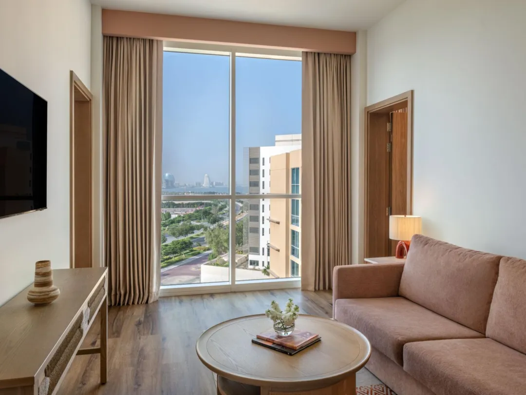 Odysseys Travel - Yas Plaza Circuit - Yas Island by IHG - Two Bedroom Suite Plaza View Theme Park Access - Living Area