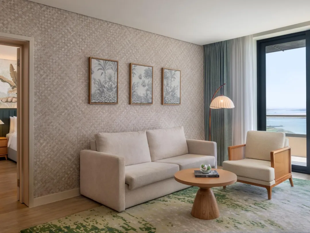Odysseys Travel - Yas Plaza Mangroves by IHG - One King Deluxe Plaza View Theme Park Access - Seating Area