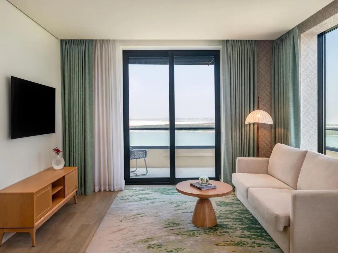 Odysseys Travel - Yas Plaza Mangroves by IHG - Two Twin Deluxe Plaza View Theme Park Access - Seating Area