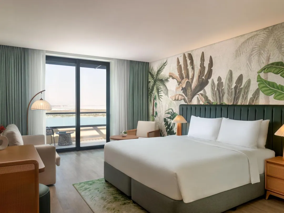 Odysseys Travel - Yas Plaza Mangroves by IHG - One King Deluxe Sea View Balcony Theme Park Access - Bedroom