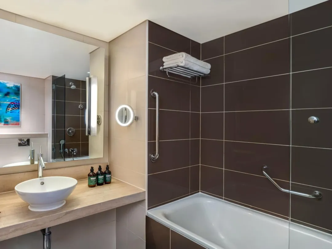 Odysseys Travel - Yas Plaza Mangroves by IHG - One King Deluxe Sea View Balcony Theme Park Access - Bathroom