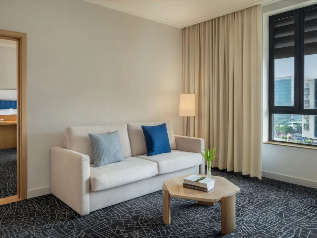 Odysseys Travel - Yas Plaza Bay - Deluxe Family Suite Plaza View - Living Area