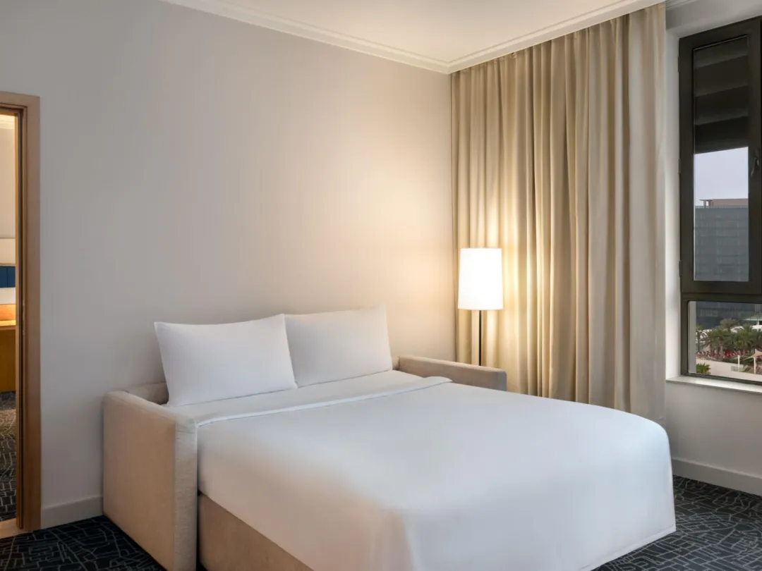 Odysseys Travel - Yas Plaza Bay - Two Bedroom Suite Plaza View - Living Area