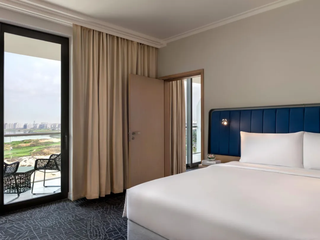 Odysseys Travel - Yas Plaza Bay - One King Deluxe Family Suite Sea View Balcony - Bedroom