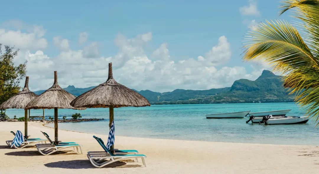 Odysseys Travel - Preskil Island Resort Mauritius - Beach - Parasols and Lagoon