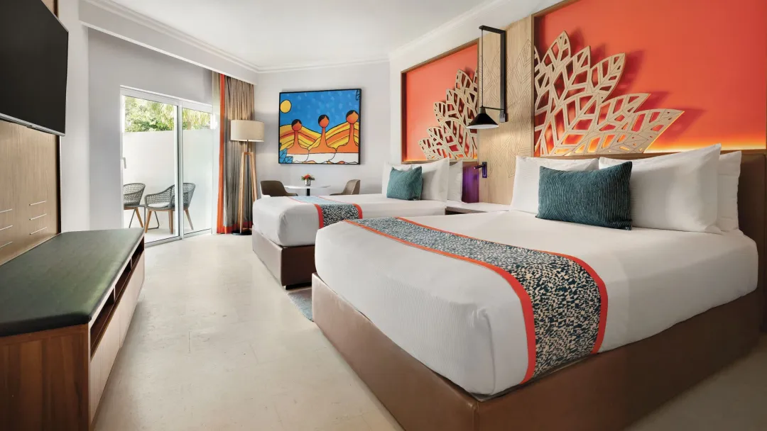 Odysseys Travel - Dreams La Romana Resort and Spa - Deluxe Garden View Two Queens - Bedroom