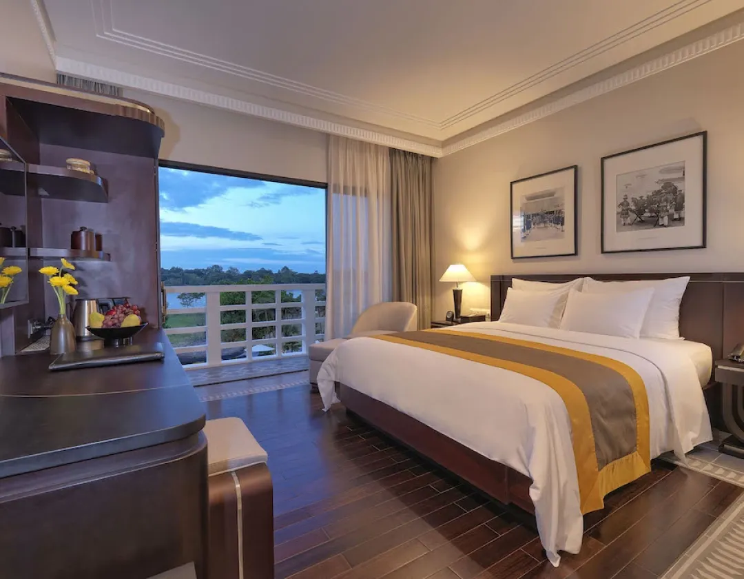 Odysseys Travel - Azerai La Residence, Hue - Superior River View - Bedroom Balcony View