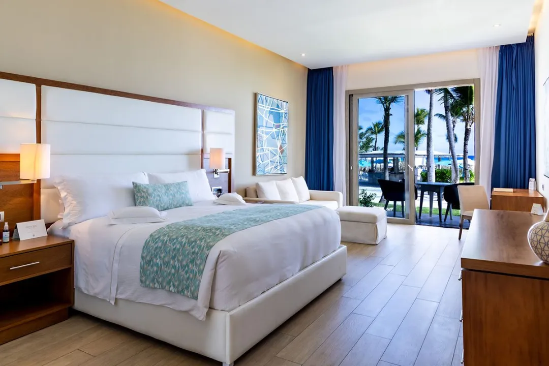 Odysseys Travel - Eden Roc Cap Cana - Deluxe Beachfront Room - Bedroom