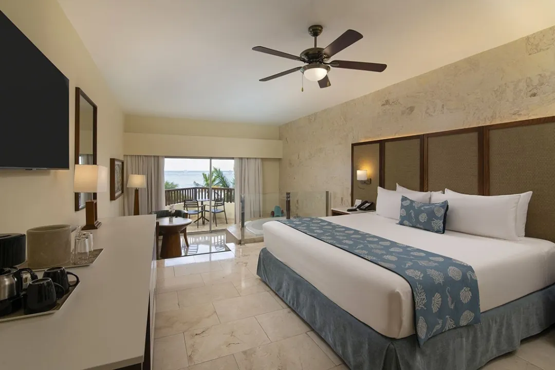 Odysseys Travel - Impressive Premium Punta Cana - Rooms - Junior Suite Premium Ocean Front View With Jacuzzi - Bedroom