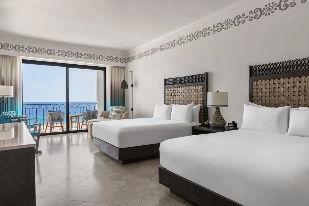 Odysseys Travel - Hilton Los Cabos - Deluxe Queen Beds Oceanfront Balcony - Bedroom