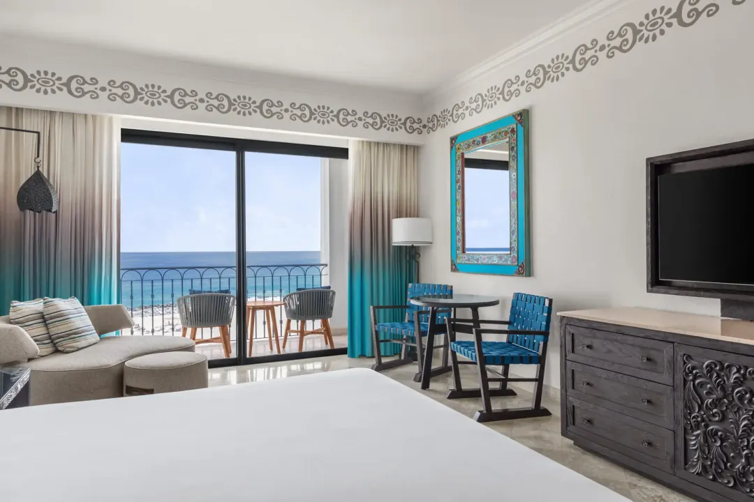 Odysseys Travel - Hilton Los Cabos - Deluxe Queen Beds Oceanfront Balcony - Seating Area