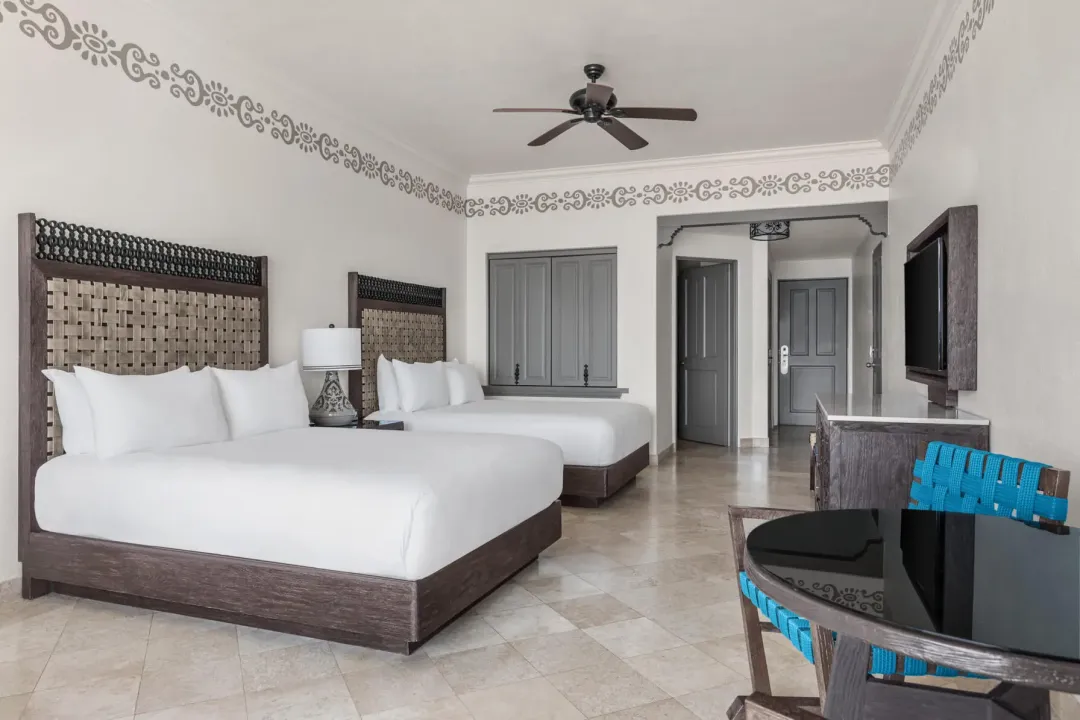 Odysseys Travel - Hilton Los Cabos - Deluxe Queen Beds Ocean View Balcony - Bedroom