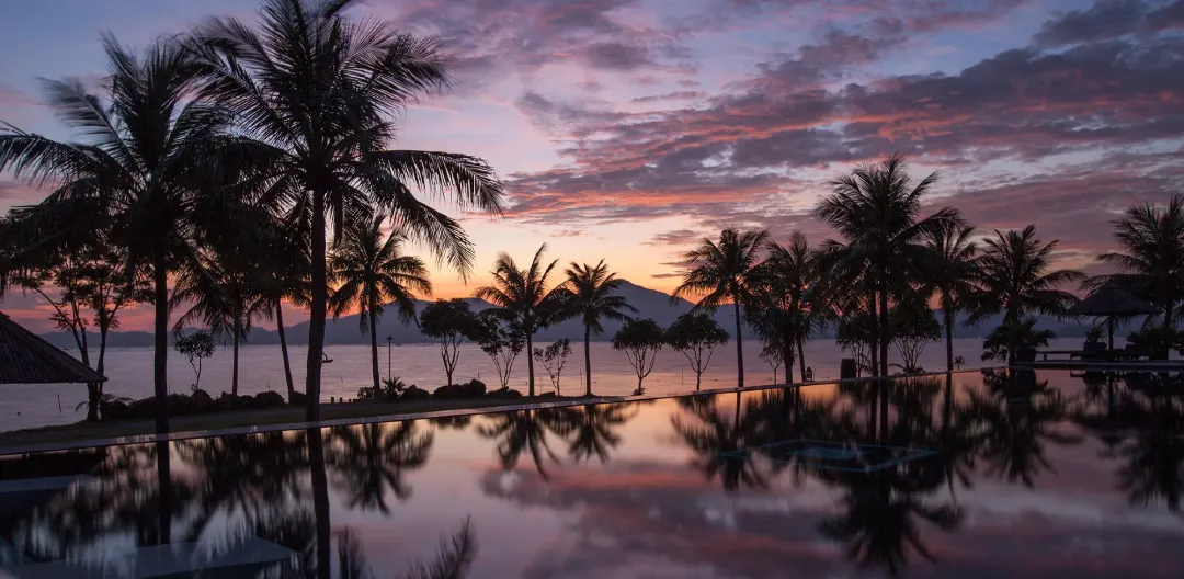 Odysseys Travel - Vedana Lagoon Resort & Spa - Sunset Pool Reflection