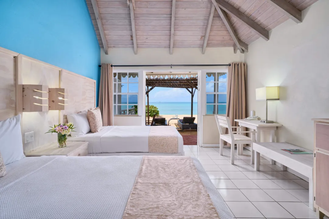 Odysseys Travel - Hawksbill Resort Antigua - Royal Palm Beachfront Room - Bedroom