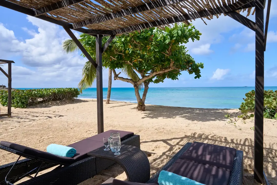Odysseys Travel - Hawksbill Resort Antigua - Royal Palm Beachfront Room - Patio