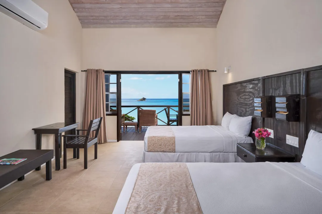 Odysseys Travel - Hawksbill Resort Antigua - Superior Sea View Room - Bedroom