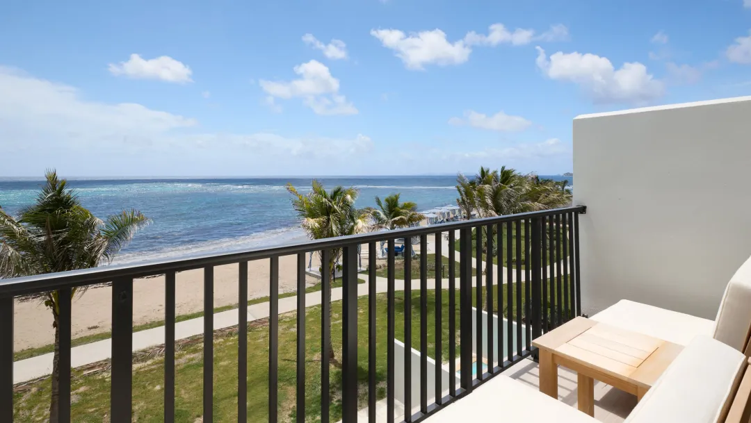 Odysseys Travel - JW Marriott St. Maarten Beach Resort and Spa - Deluxe Guest Room Beachfront - Balcony View