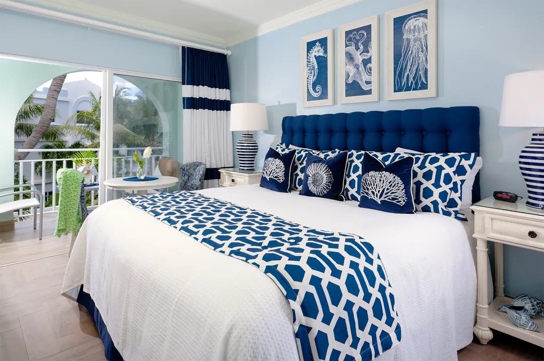 Odysseys Travel - Oyster Bay Beach Resort - Premier Courtyard Room - Bedroom