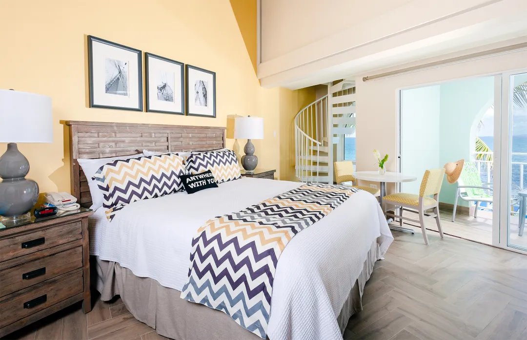 Odysseys Travel - Oyster Bay Beach Resort - Deluxe Courtyard Loft - Bedroom Area