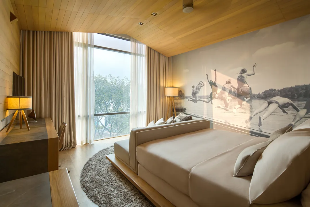 Odysseys Travel - Fusion Suites Saigon - Rooms - One Bedroom Suite - Bedroom Seating Area