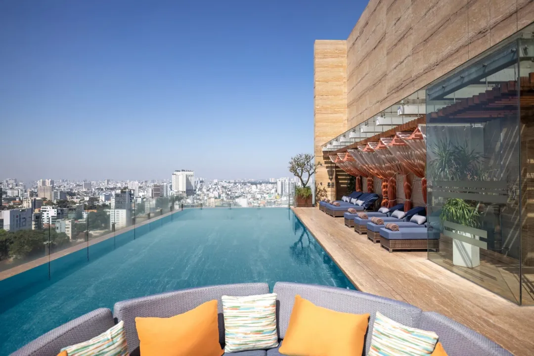 Odysseys Travel - Hotel des Arts Saigon - Infinity Pool Loungers
