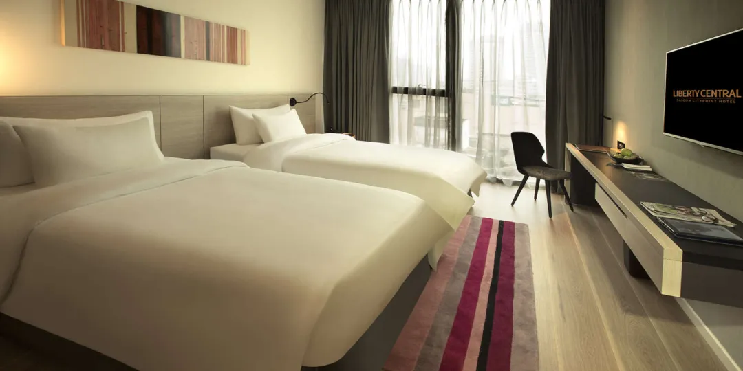 Odysseys Travel - Liberty Central Saigon City Point - Rooms - Premier City View - Bedroom
