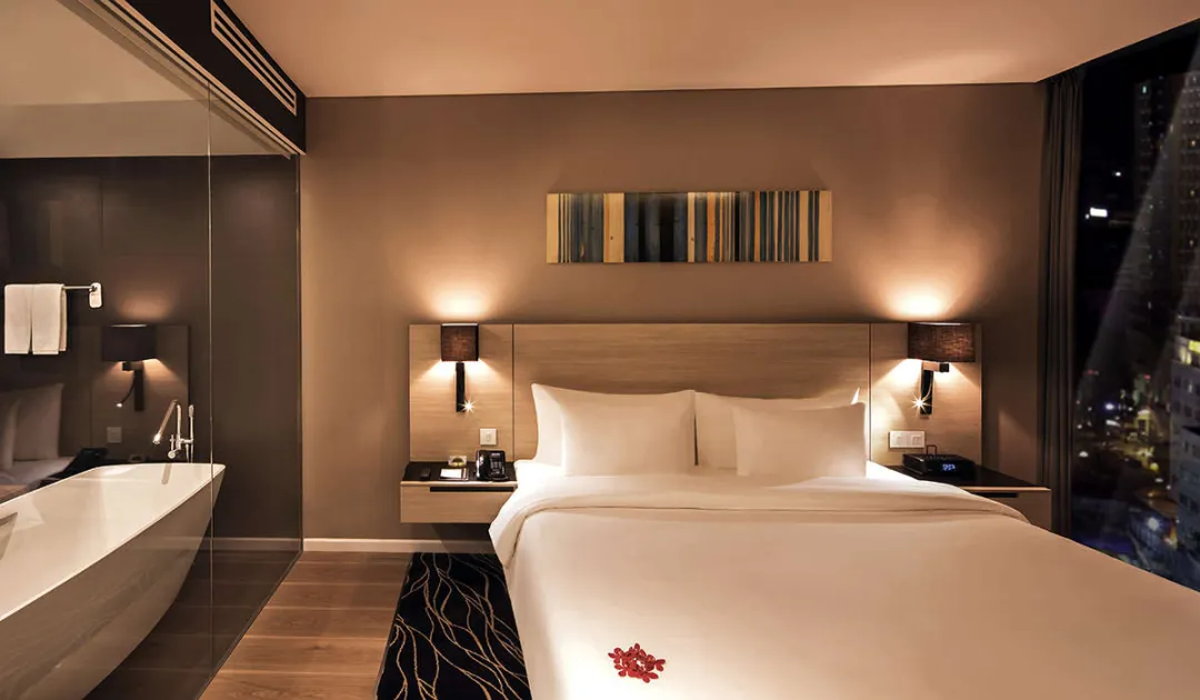 Odysseys Travel - Liberty Central Saigon City Point - Rooms - Liberty Central Suite - Bedroom
