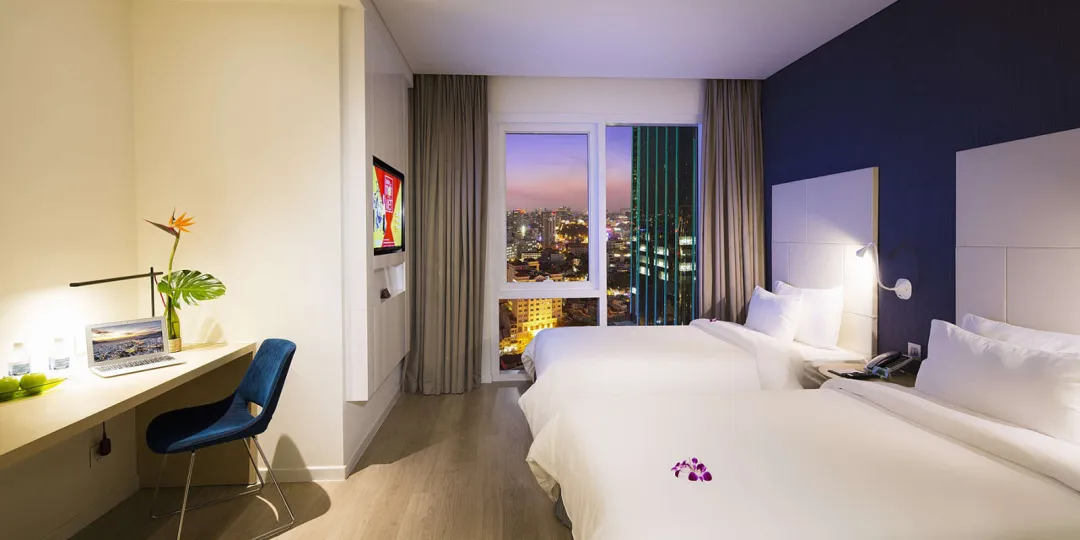 Odysseys Travel - Liberty Central Saigon Riverside - Rooms - Deluxe - Bedroom