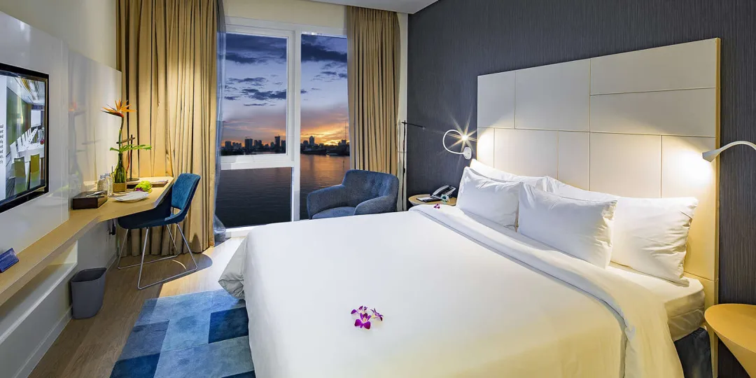 Odysseys Travel - Liberty Central Saigon Riverside - Rooms - Deluxe - Bedroom View