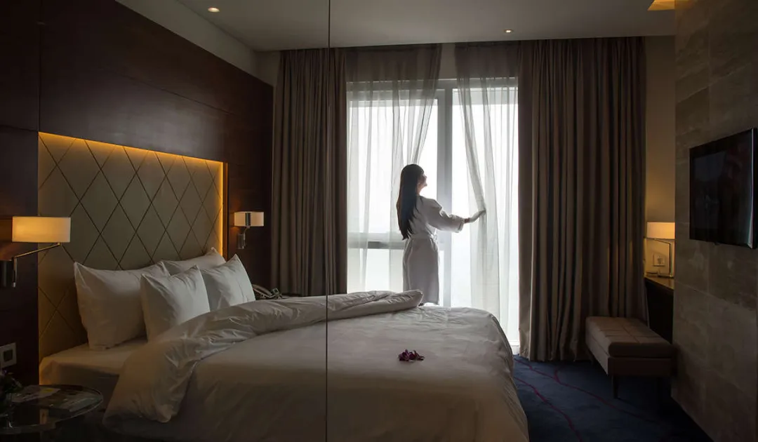 Odysseys Travel - Liberty Central Saigon Riverside - Rooms - Liberty Central Suite - Bedroom