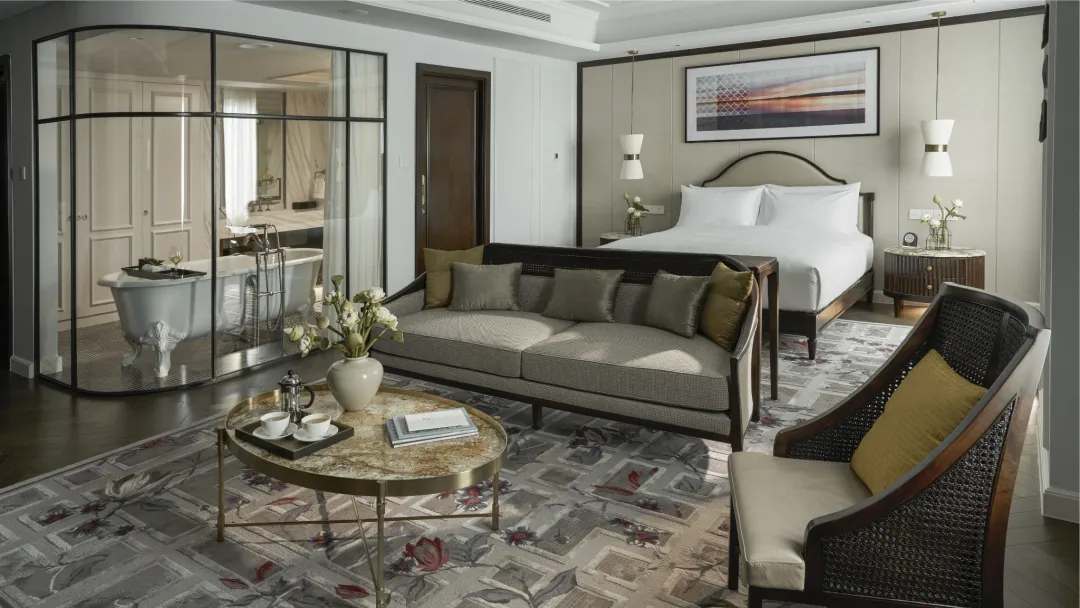 Odysseys Travel - Mai House Saigon - Rooms - Mai Suite - Bedroom and Living Area