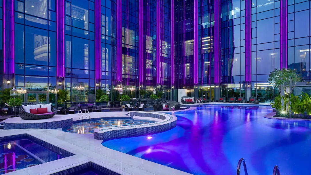 Odysseys Travel - The Riverie Saigon - Pool at Night