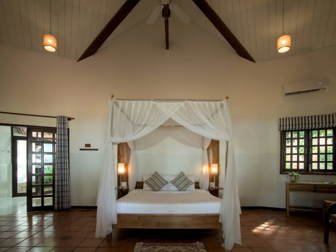 Odysseys Travel - Cassia Cottage Phu Quoc - Rooms - Large Seaview Guest Room - Bedroom