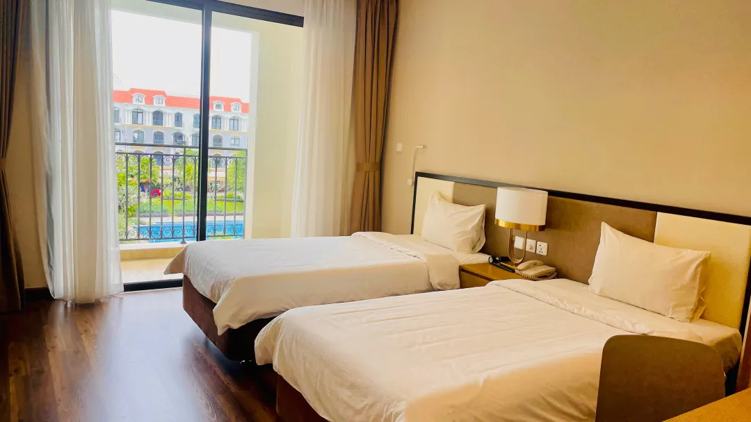 Odysseys Travel - VinHolidays Fiesta Phu Quoc - Rooms - Standard Pool View Room - Bedroom