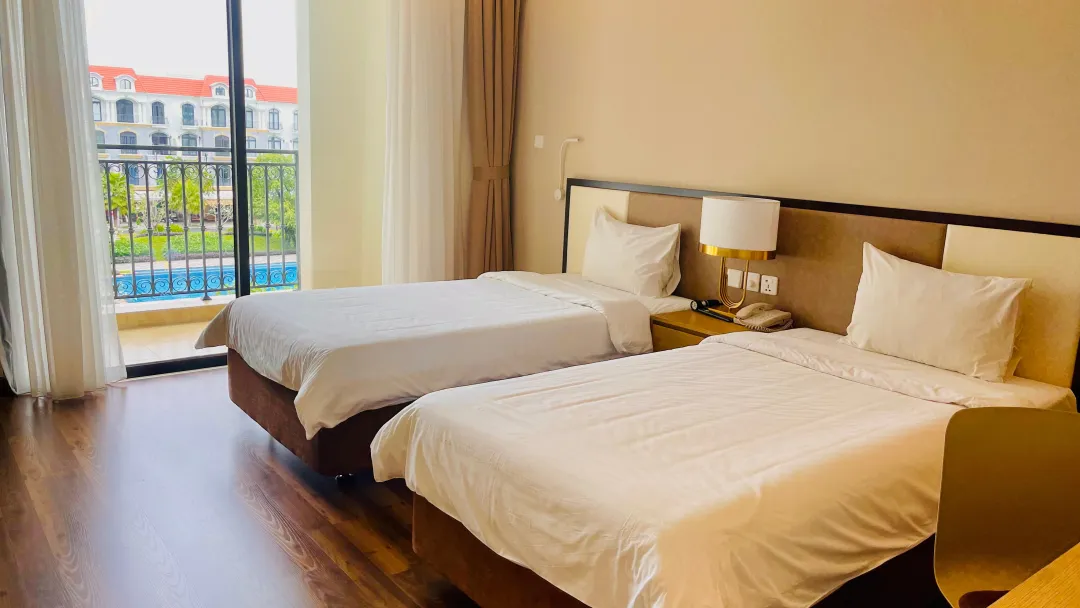 Odysseys Travel - VinHolidays Fiesta Phu Quoc - Rooms - Standard Pool View Room - Bedroom Pool View